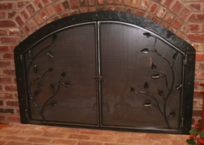 Arched fireplace doors