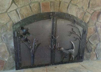 Bird dog fireplace doors